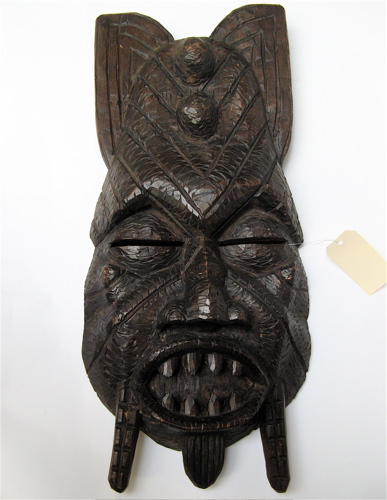 Appraisal: A COLLECTION OF AFRICAN ITEMS a carved wooden large mask