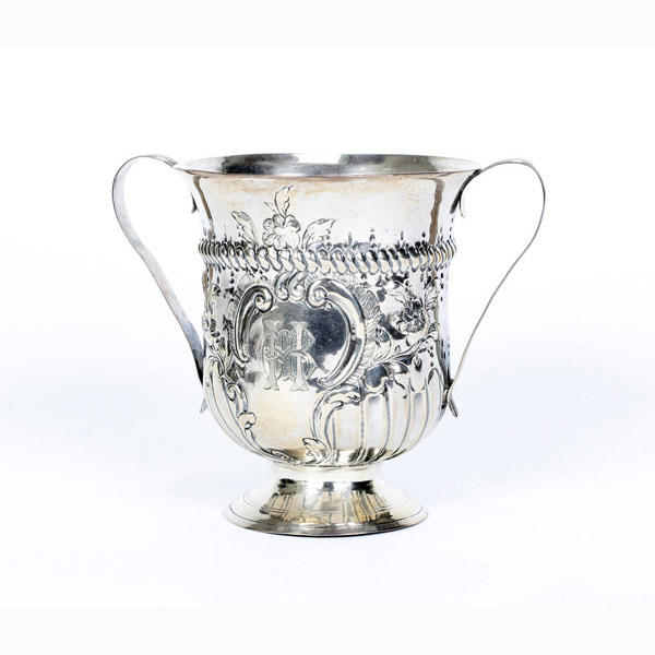 Appraisal: George III double handle repousse cup London ozt H Possible