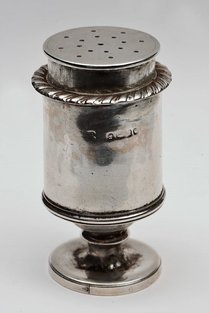 Appraisal: A GEORGIAN SILVER PEPPER plain body standing on a flared