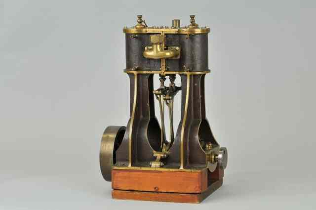 Appraisal: MARINE ENGINE Made of cast brass heavily machined a well