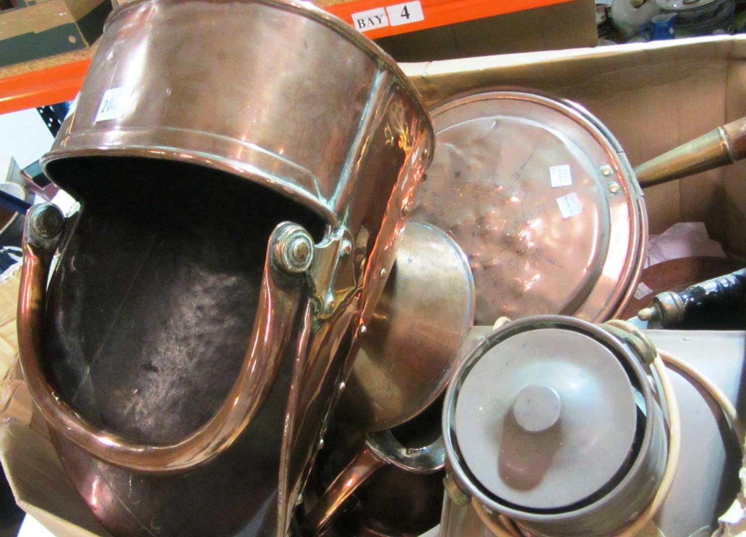 Appraisal: A quantity of copper and brass a jam pan a