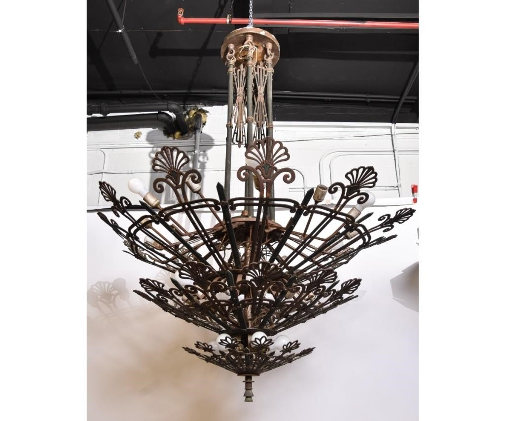 Appraisal: A massive continental Art Deco three-tiered -light brass and metal