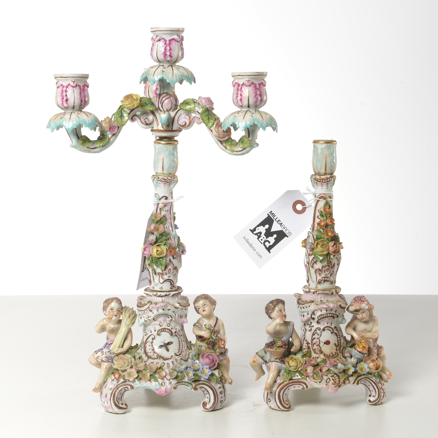 Appraisal: PAIR SITZENDORF FIGURAL PORCELAIN CANDLESTICKS c - German one with