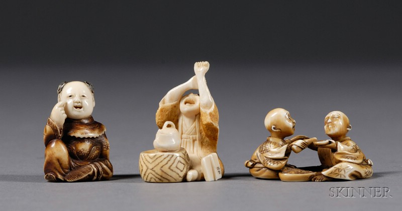 Appraisal: Three Ivory Netsuke th century a karako two men drinking