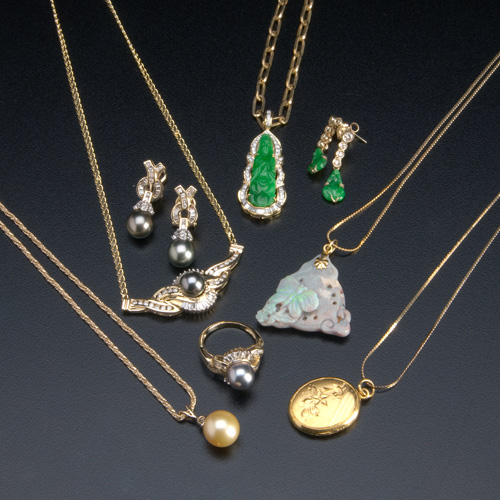 Appraisal: Contemporary gold jewelry with diamonds and gemstones includes jade carved