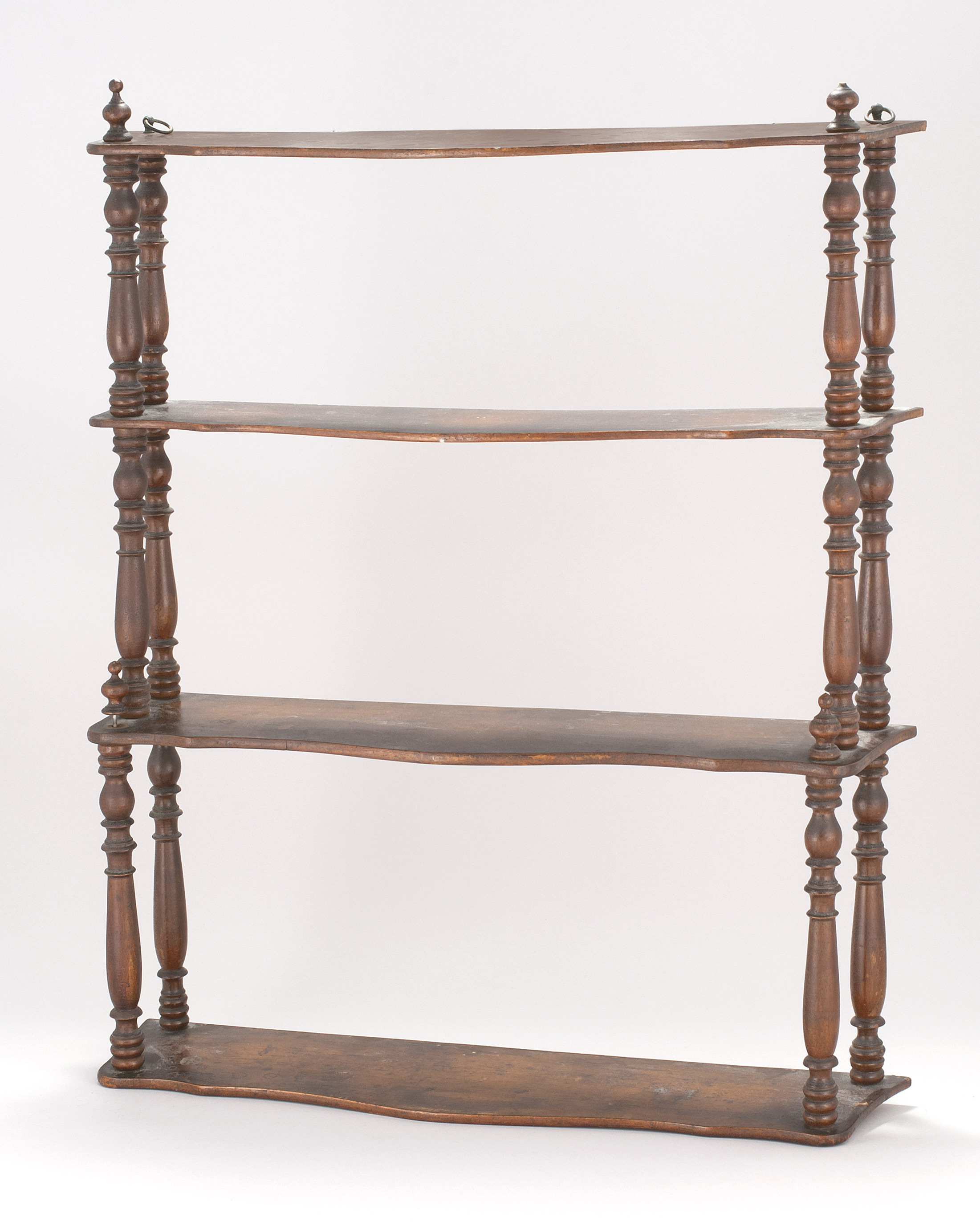 Appraisal: LATE TH CENTURY FOUR-TIER WHATNOT SHELF in mahogany Spool-turned sides