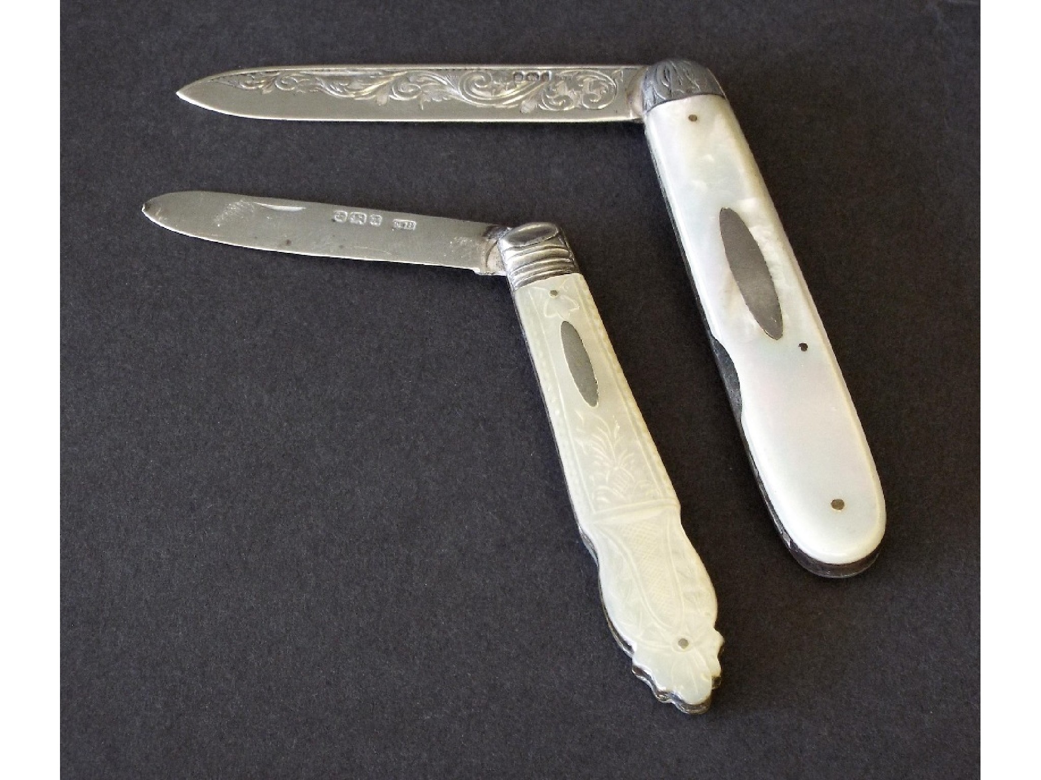 Appraisal: Two late Victorian silver and mother of pearl handled folding