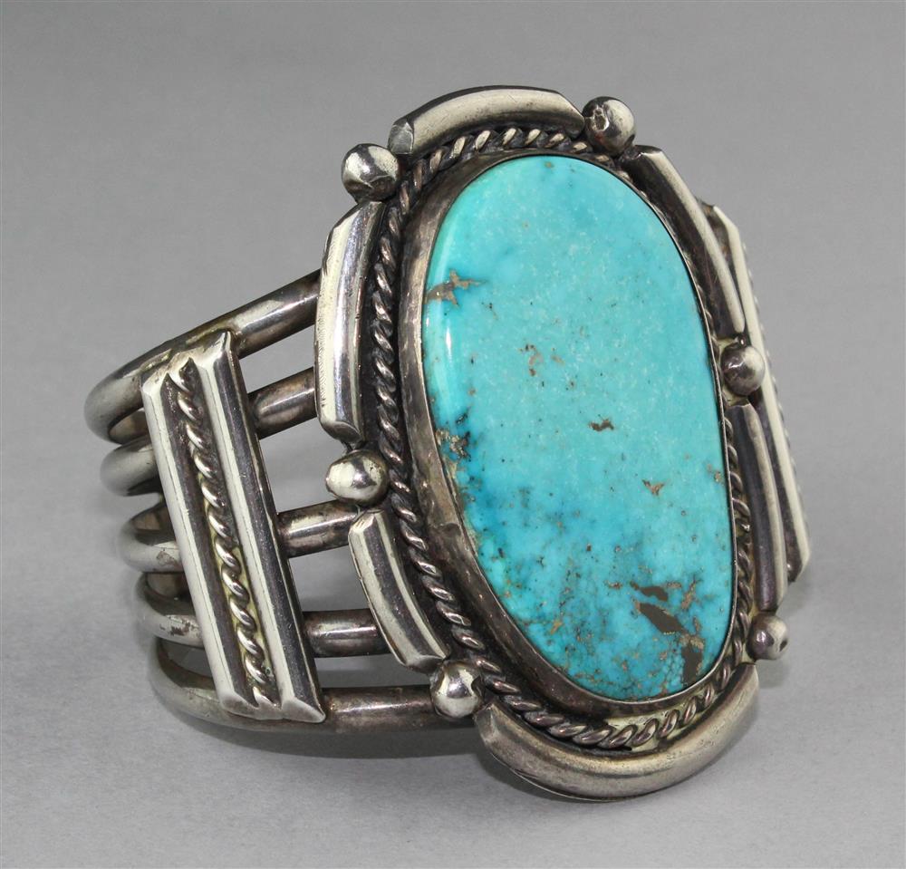 Appraisal: VINTAGE NATIVE AMERICAN SILVER AND TURQUOISE CUFF the cuff holds