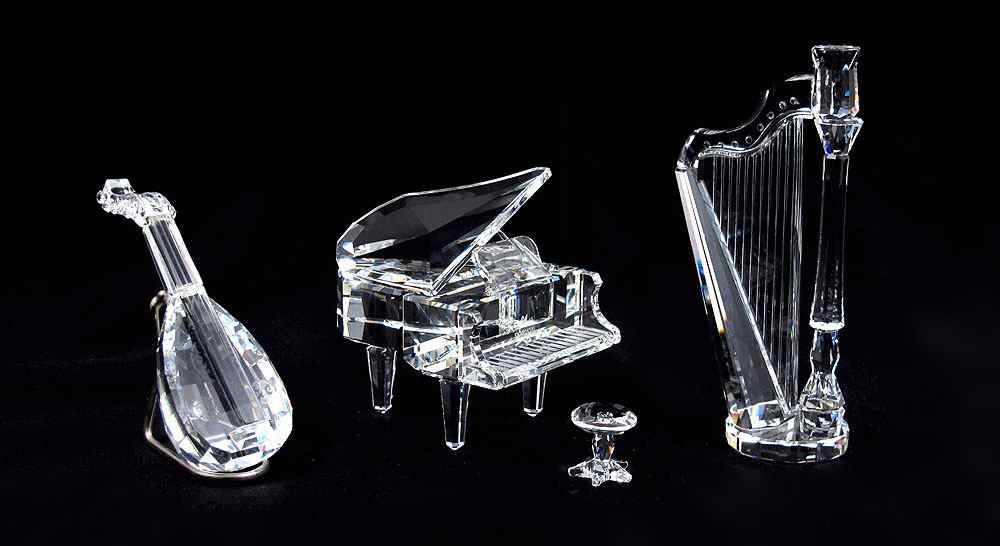 Appraisal: SWAROVSKI CRYSTAL FIGURES piece lot to include PIANO with STOOL