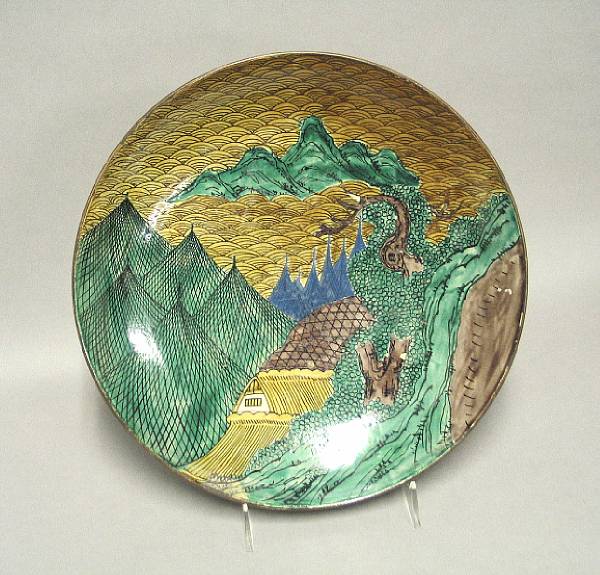 Appraisal: A Kutani enameled stoneware charger Depicting a scene of a