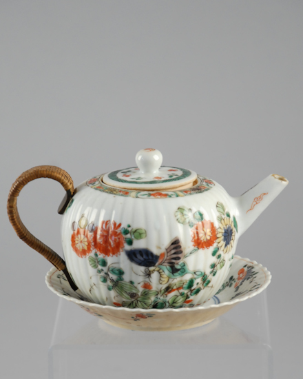 Appraisal: A Diminutive Chinese Kang-xi Teapot and Underplate with birds in