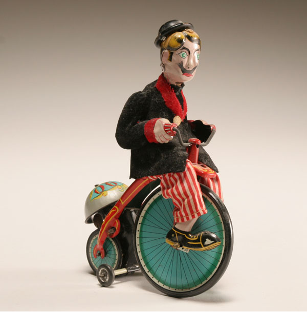 Appraisal: TPS wind up Gay Nineties tricycle toy tin litho gent