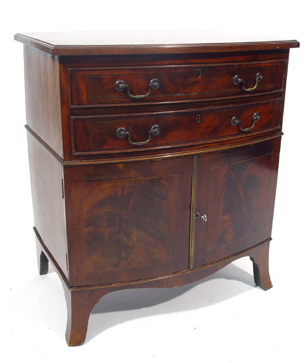 Appraisal: th Century mahogany bow fronted commode with two lockable drawers