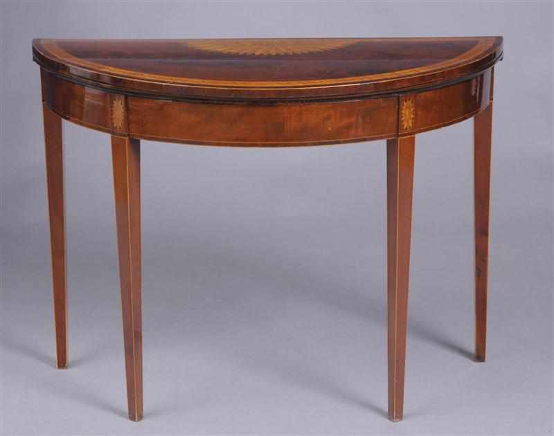 Appraisal: GEORGE III INLAID MAHOGANY DEMILUNE GAMES TABLE The folding top