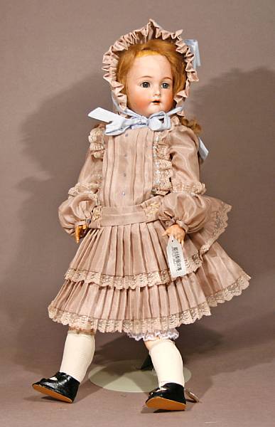 Appraisal: A German bisque-head doll incised K R Simon amp Halbig