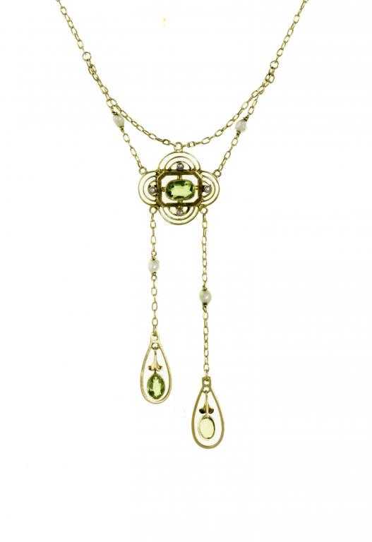 Appraisal: A LIBERTY CO PERIDOT SEED PEARL AND GOLD OPENWORK NEGLIG