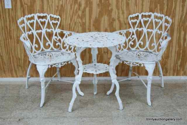 Appraisal: Cast Aluminum Patio Table Chairs SetIncludes the Table and matching