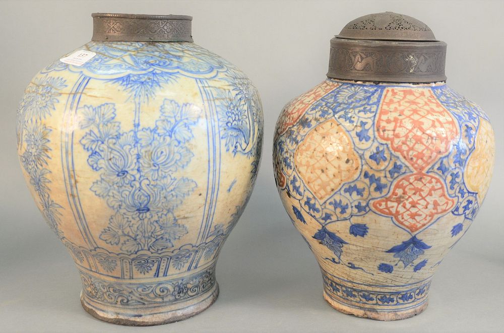 Appraisal: Two Early Jars in Persian Taste each fitted with metal