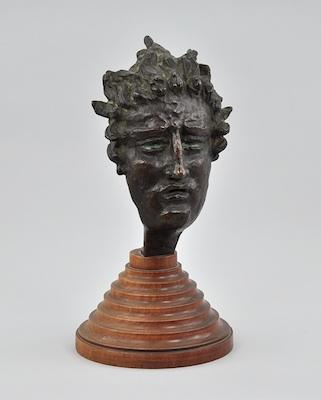 Appraisal: A Cast Bronze Mask of Apollo The modern cast bronze