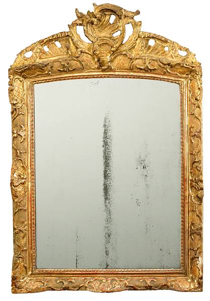 Appraisal: A Louis XV giltwood mirrorsecond quarter th century The arched