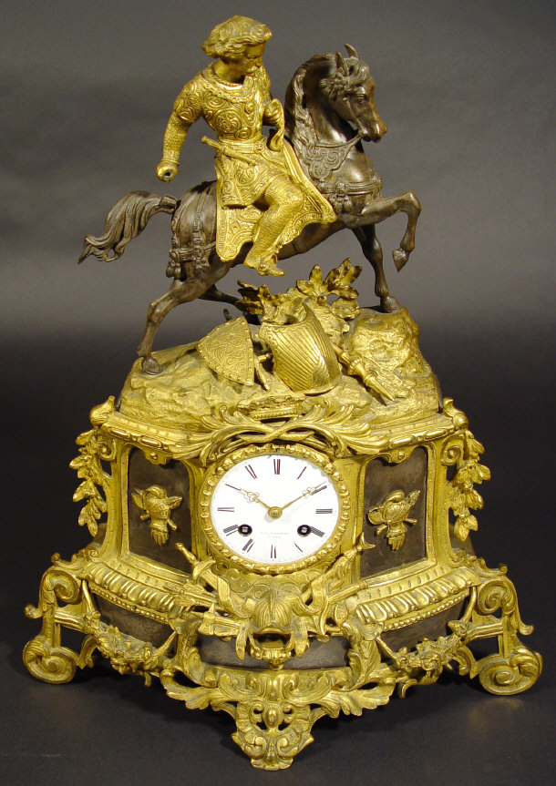 Appraisal: th Century brass mantel clock surmounted with a knight on