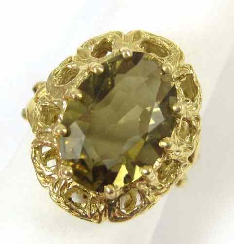 Appraisal: LEMON CITRINE AND FOURTEEN KARAT GOLD RING set with a