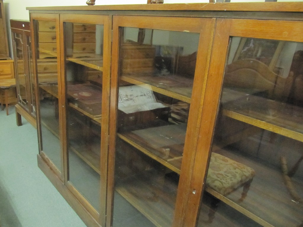 Appraisal: Mahogany bookcase and a mahogany display cabinet