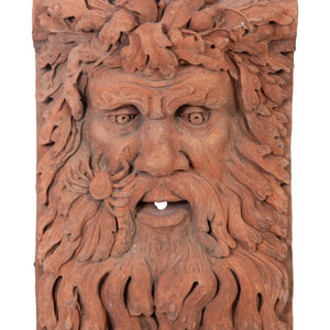 Appraisal: A Terra Cotta Fountain Head Depicting the Face of Neptune