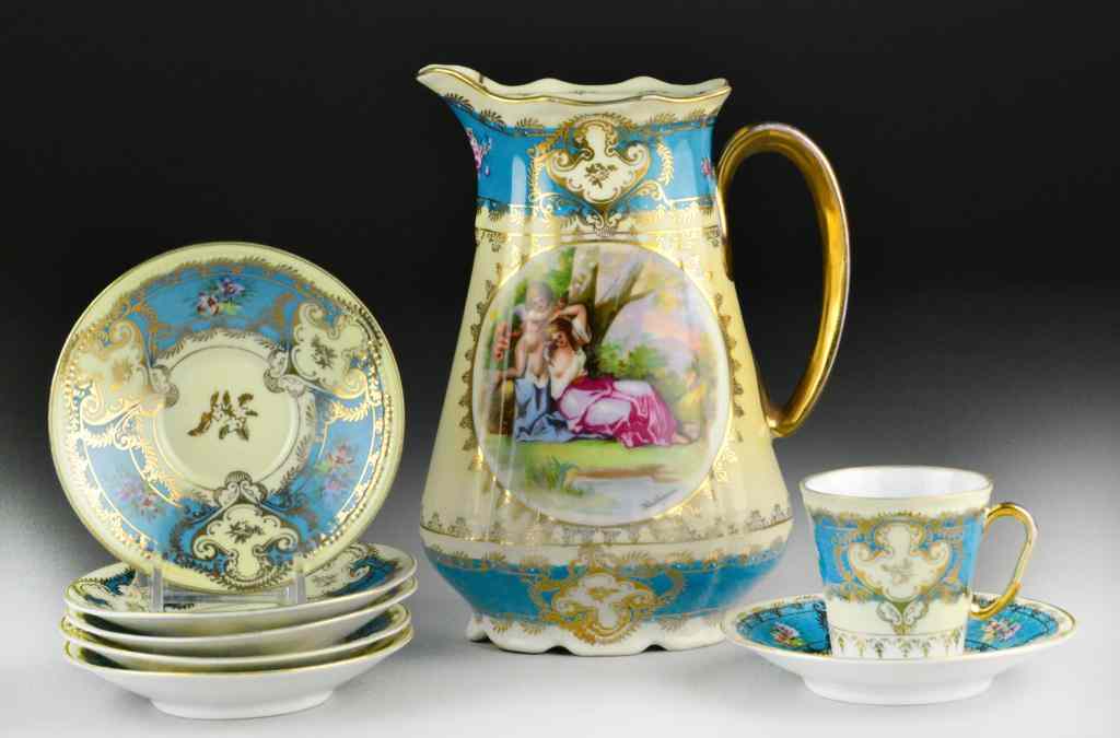 Appraisal: Pcs Royal Vienna-Style Porcelain Pitcher CuConsisting of a gilt decorated