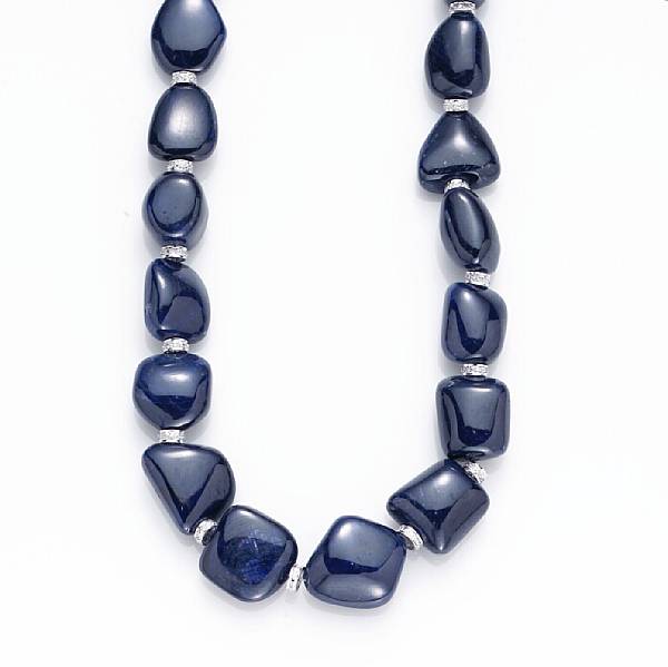 Appraisal: A tumbled sapphire bead and diamond necklace estimated total sapphire