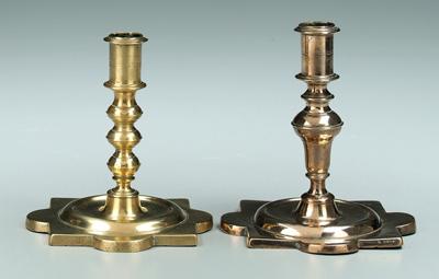 Appraisal: Two th century brass candlesticks similar square arabesque shaped bases