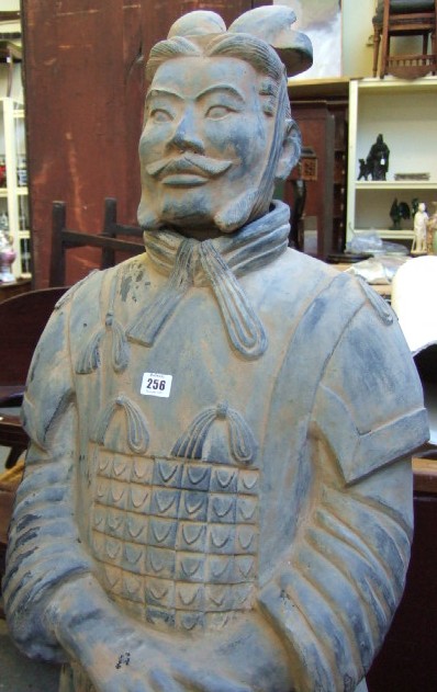 Appraisal: A large reproduction terracotta Army Warrior approximately m high Illustrated