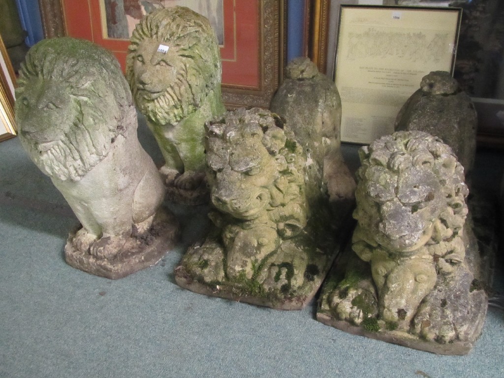 Appraisal: Two pairs of garden figures of lions