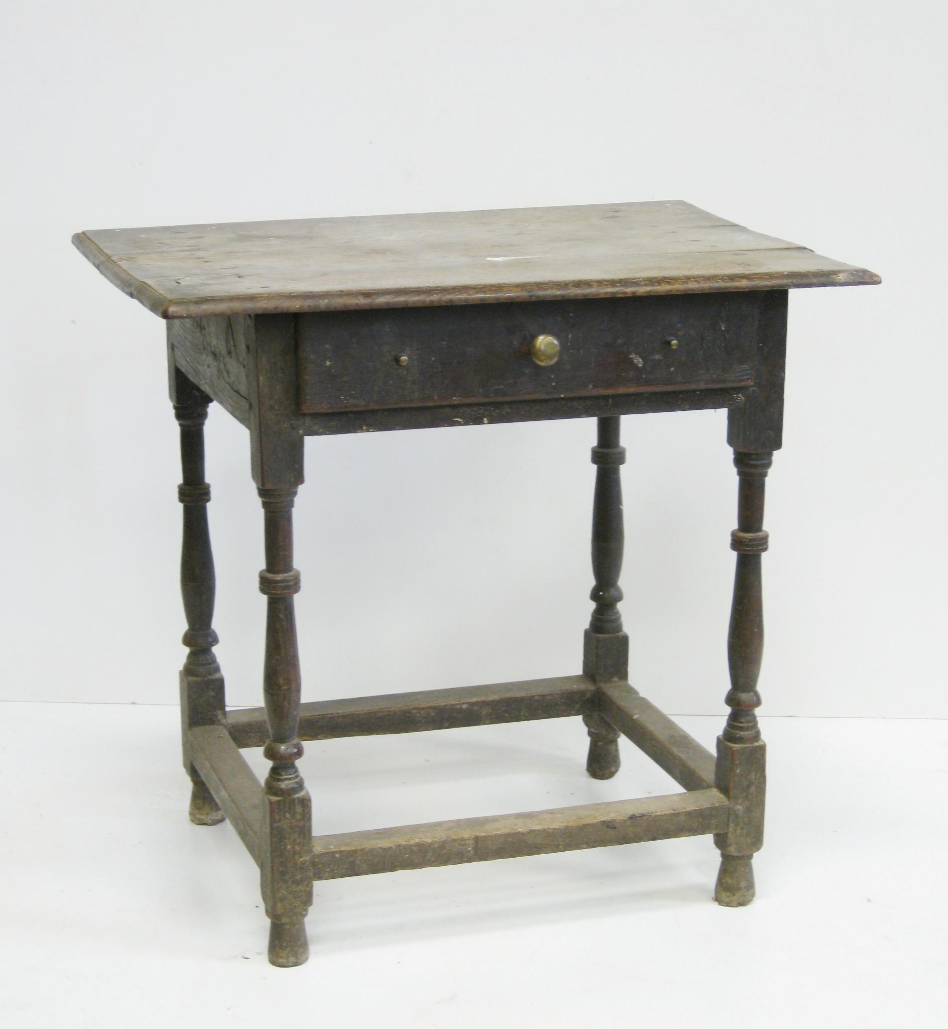 Appraisal: An th Century oak Side Table fitted frieze drawer on