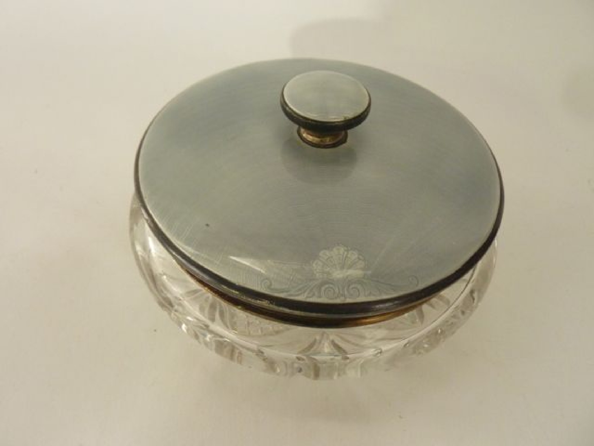 Appraisal: A George V silver and enamelled glass dressing table powder