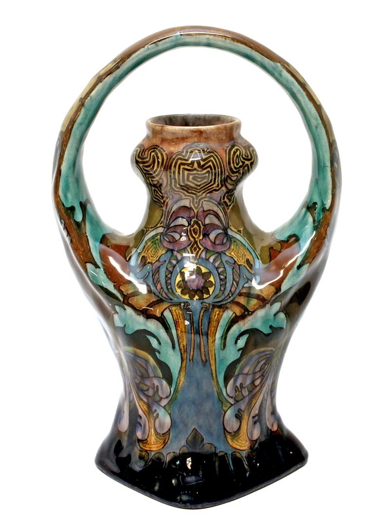 Appraisal: A Rozenburg earthenware vase c with loop handle over a