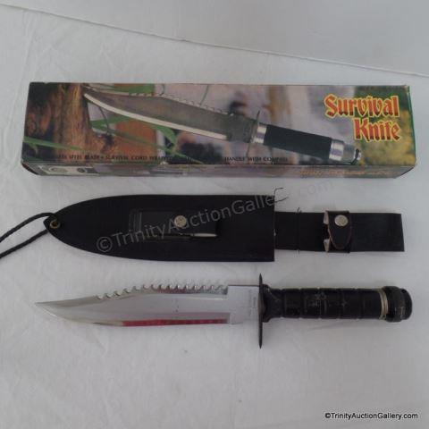 Appraisal: Survival Knife w Sharpening Stone Sheath Common Military style large