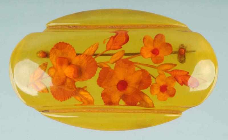 Appraisal: Bakelite Reverse Carved Floral Pin Condition Excellent Size - Dia