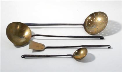 Appraisal: Group of brass and iron kitchen utensils and a wooden