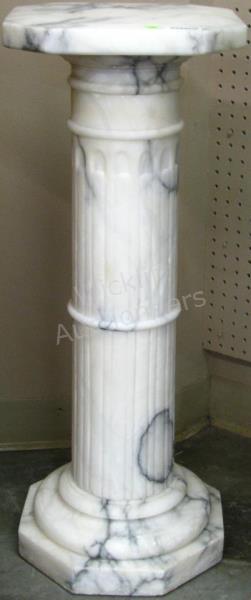 Appraisal: A white marble pedestal columnar design octagonal base and top