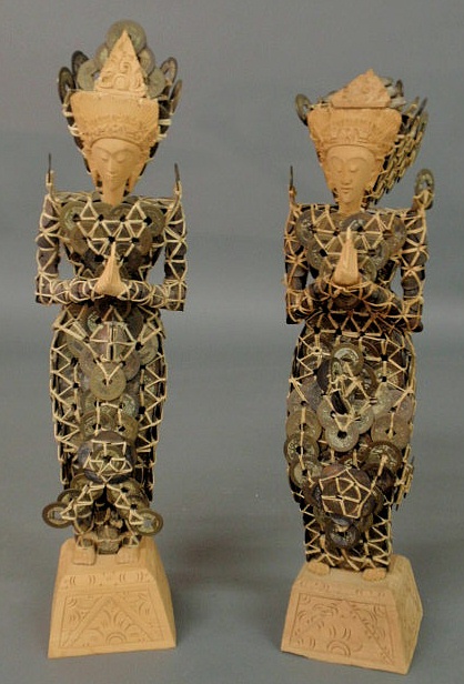 Appraisal: Two Indonesian wedding figures made from old coins and wood