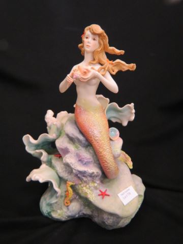 Appraisal: Cybis Porcelain Figurine of a Mermaid seated on a rock