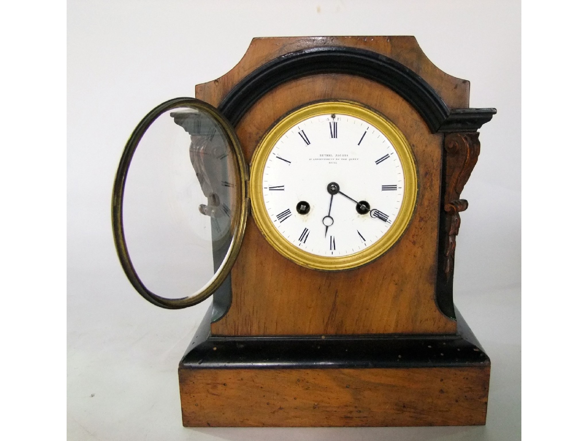 Appraisal: A Victorian walnut mantle clock the case with ebonised banding