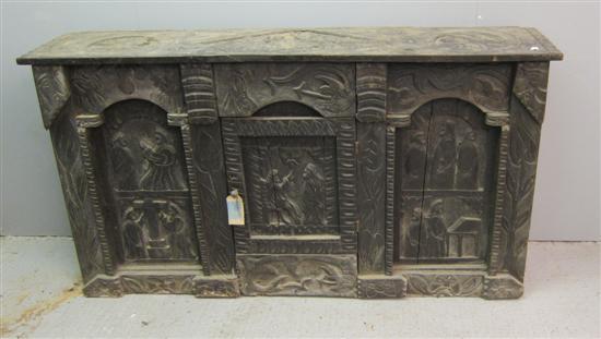 Appraisal: Antique carved cabinet decorated with various scenes with figures the