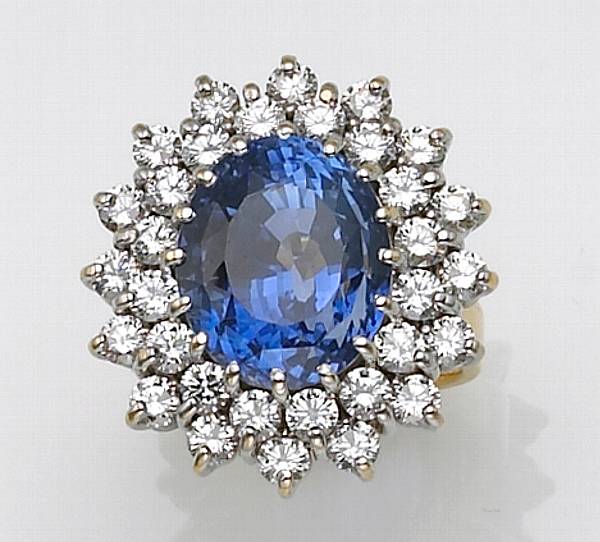 Appraisal: A natural sapphire diamond and twenty-two karat bicolor gold ring