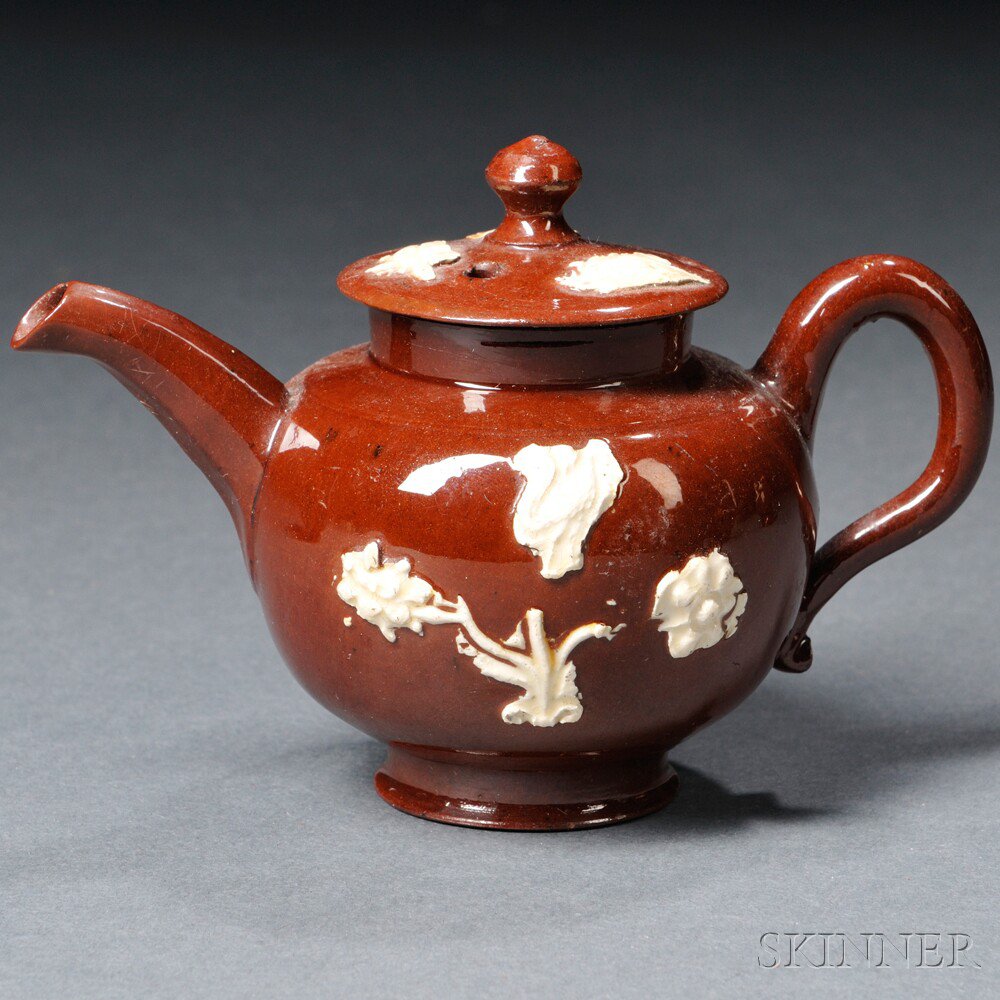 Appraisal: Staffordshire Glazed Redware Miniature Teapot and Cover England c globular