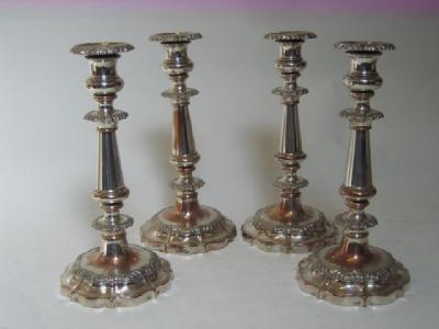 Appraisal: A SET OF FOUR OLD SHEFFIELD PLATE CANDLESTICKS with detachable