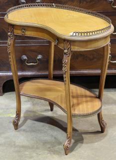 Appraisal: Continenal fruitwood tiered tricoteuse the kidney shaped top fitted with