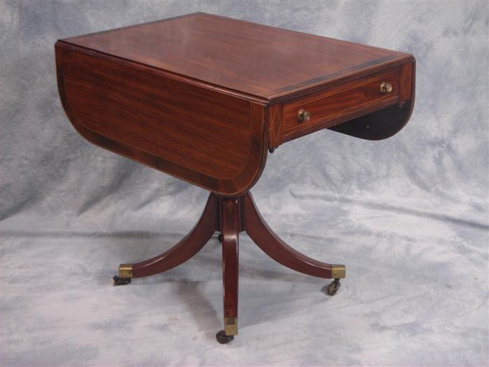 Appraisal: Banded rosewood mahogany Regency center table with a drawer excellent