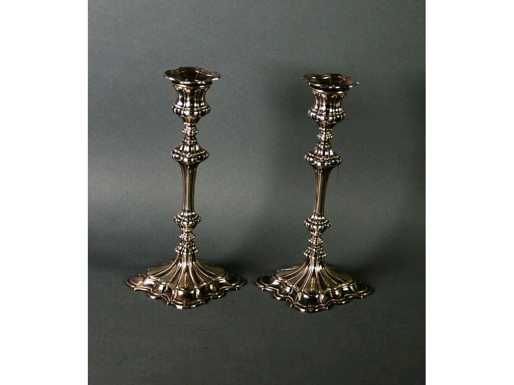 Appraisal: PAIR OF GEORGIAN STYLE MOULDED ELECTROPLATED TABLE CANDLESTICKS by Elkington